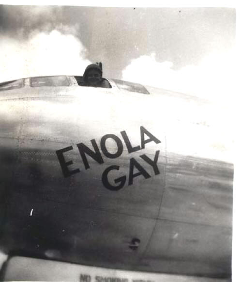 Galusha poses with the Enola Gay